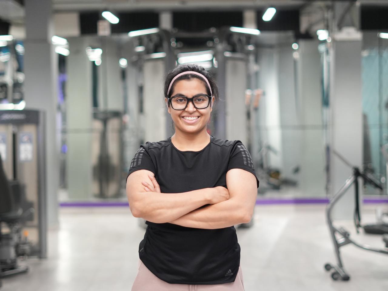 Aiman, women's health and sustainable strength coach at BareBarbell